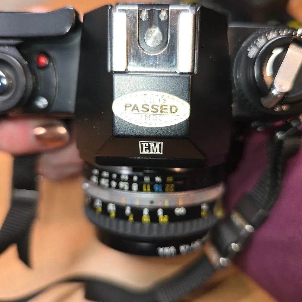 Nikon‎ EM 35mm Camera body lens series e flash cases for camera manuals timer